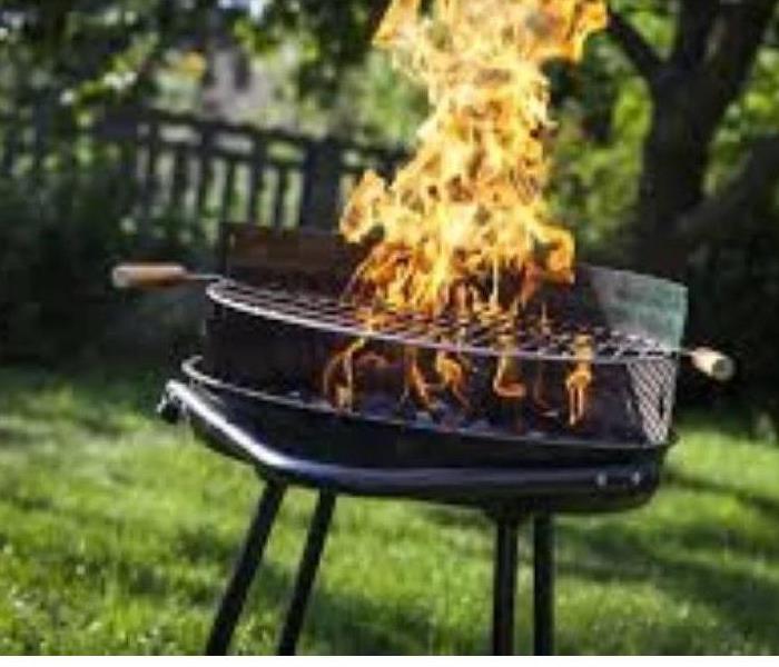 Grill with large fire