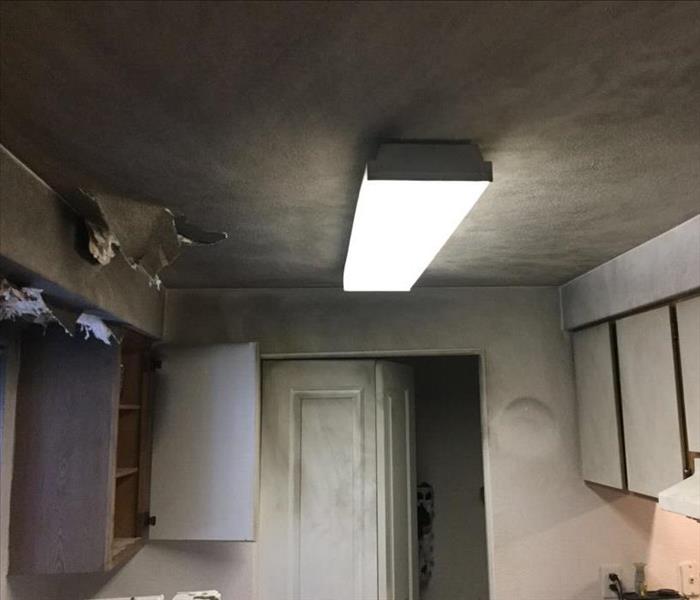 Kitchen Fire Damage In Apartment